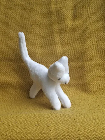Small white plush Cat from top