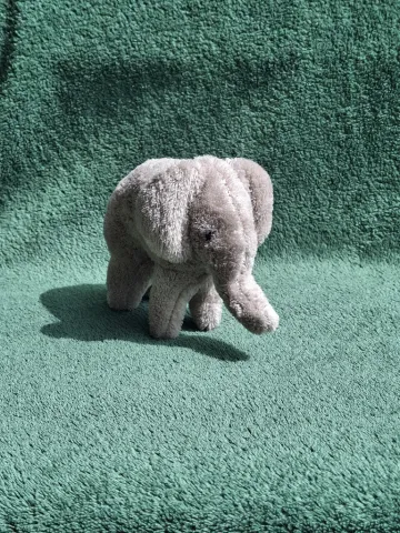 Small gray plush Elephant from top