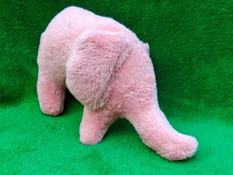 Small pink plush sleeper Elephant from top